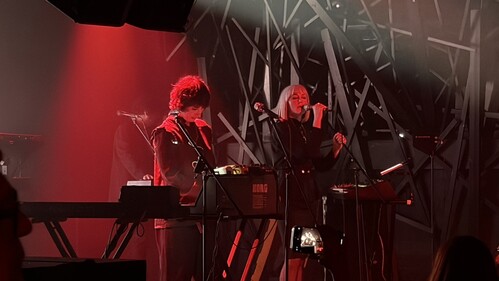 Photo of the trio performing on stage